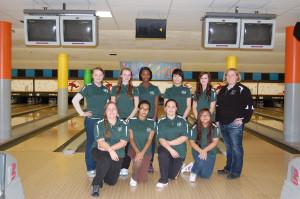 The 2013-14 JV and Varsity girls’ bowling team. (Back row) Haley Haskell, Sammi Linebach, Taj Milton, My Nyguen, Paige Hennick, Coach Amanda Dvorak (Front row) Glennna Whiteman, Jalaina Thompson, Kelly Wear, Arianna Lovan