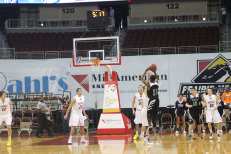 Senior Terrance Bush Jr shoots up a 3-point shot against Waukee.