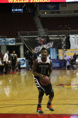 # 11 Terrance Bush Jr shoots a free throw against Waukee.