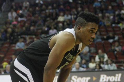 Senior guard Teyontae Jenkins catches his breathe before a play against Waukee.