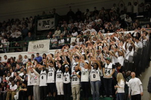 The North High Student Section prepares before a free throw for the Polar Bears.