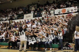 The famous North High student sections does their famous Roller Coaster.