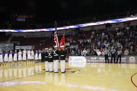 The North High ROTC presents the flags for the National Anthem before the game.