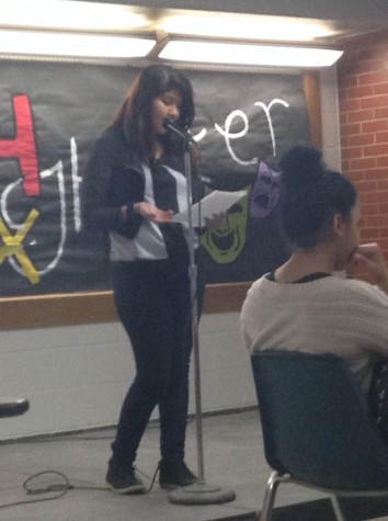 Yanet Velasquez recites a poem during Lunch Box Theatre.