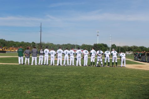 The North High varsity baseball team prepares for the game against Pella. 