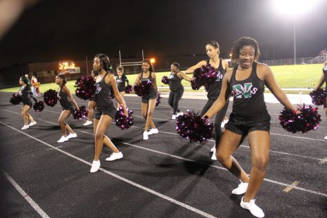 The dance team performs during halftime.