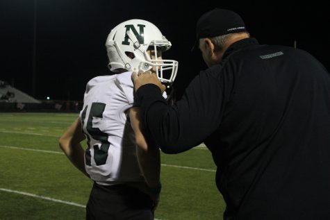 Senior Kaine Burch gets the next play from Coach Gilson.