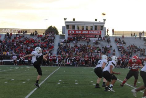 Senior Andrew Phillips punts the ball.