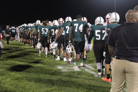 The Polar Bears shake Newtons' hands after the game.