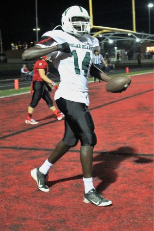 Senior James Deng celebrates a touchdown.